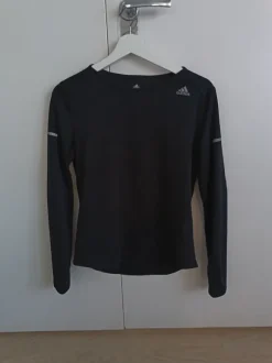 Adidaksen juoksupaita koko S