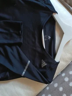 Adidaksen juoksupaita koko S
