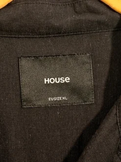 Black short sleeved buttonup loose fit