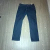 Dark blue jeans (baggy)