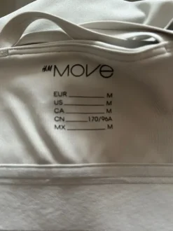 HM harmaa treenitoppi