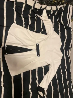 Kaunis valkoinenpäällys takki