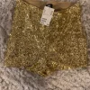 Kultaiset shortsit H&M S