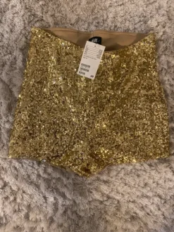 Kultaiset shortsit H&M S
