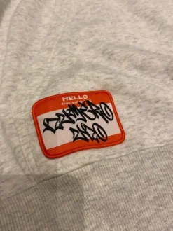 Light grey hoodie with print