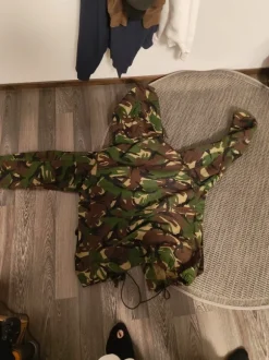 miesten maasto takki