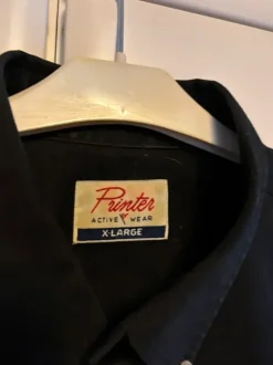 Miesten musta kauluspaita