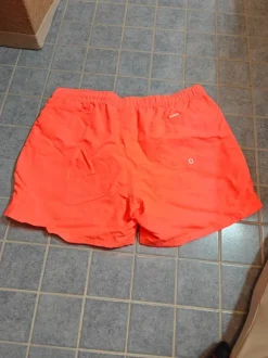 miesten oranssit uimashortsit