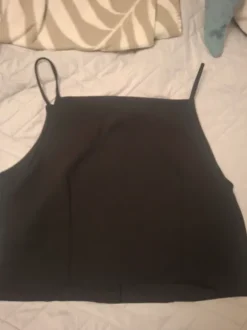 Musta puvunkankaine toppi