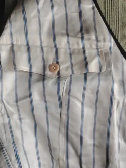 Musta vintage-liivi koko noin S-M