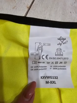 Neonkeltainen huomioliivi