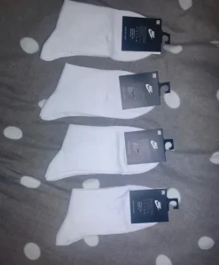 Nike baltos kojinės