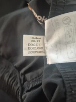 Reebok Miesten ohuet urheiluhousut