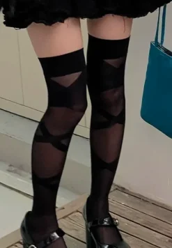 Thin sheer black thigh-high stockings