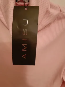 Vaaleanpunainen poolopaita