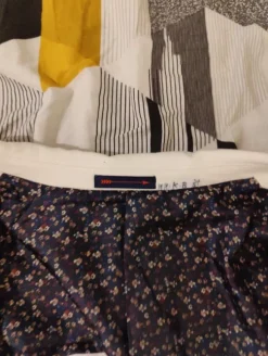 Valkoinen puvuntakki